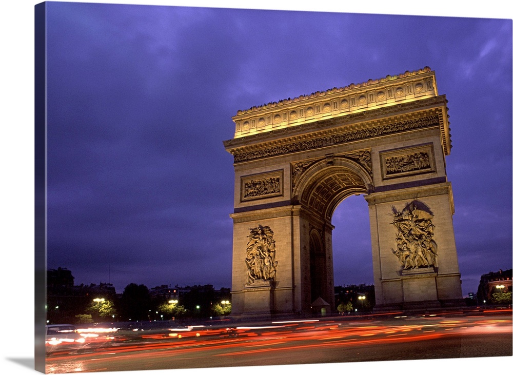 Paris, France. Famous Arc de Triomphe Monument at Sunset.