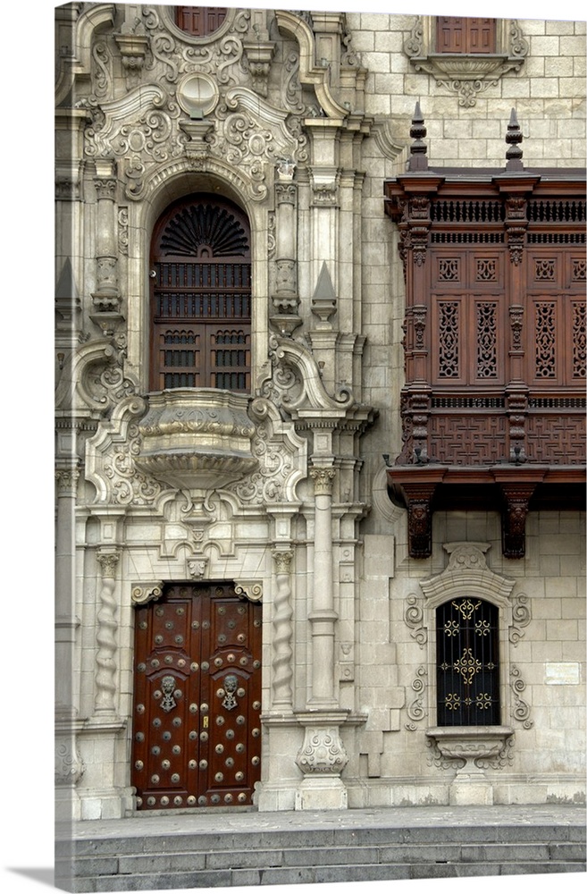 South America, Peru, Lima. Historic Plaza de Armas (aka Plaza Mayor). Moorish style wooden balcony of the Archbishop's Pal...