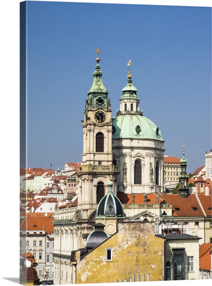 Europe, Czech Republic, Prague. Prague rooftops and St. Nicholas Cathedral as seen from above.