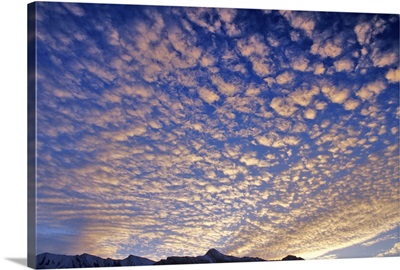 Puffy clouds at sunrise, Canadian Rockies in Banff National Park, Alberta