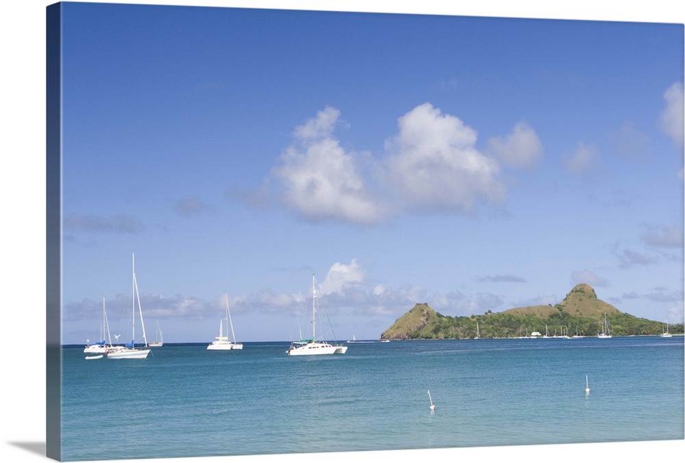 Sailboats anchored off of Reduit beach on the island of St. Lucia in the southern Caribbean.