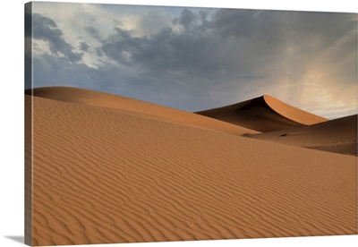 Sand Dunes Glow Orange At Sunset In The Sahara Desert