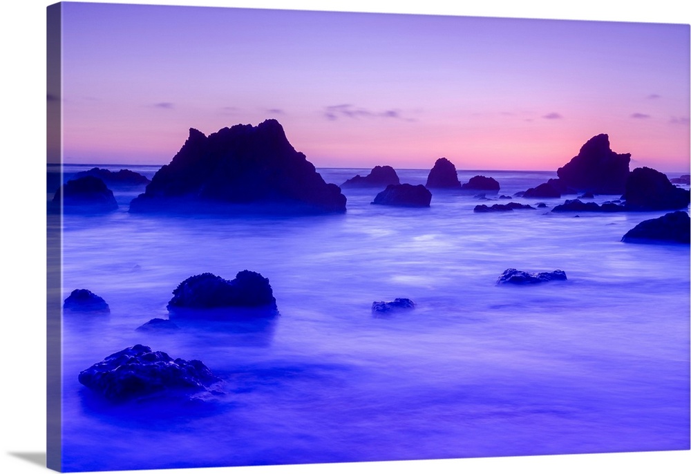 Sea stacks at dusk, El Matador State Beach, Malibu, California USA.