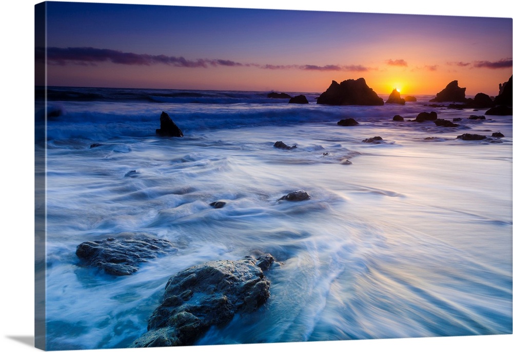 Sea stacks at sunset, El Matador State Beach, Malibu, California USA.