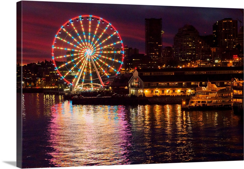 United States, Washington, Seattle. The Seattle Great Wheel on the waterfront in downtown Seattle in the evening.