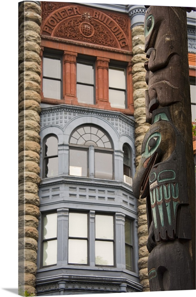 Washington, Seattle, Totem pole and Pioneer building at historic Pioneer Square.