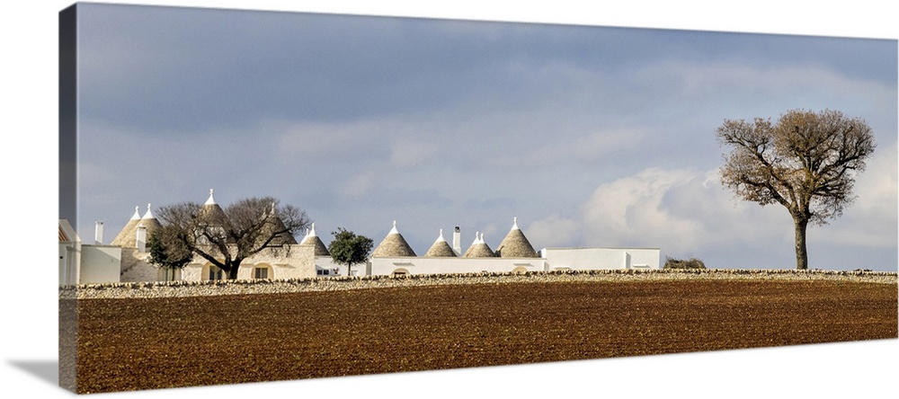 Several typical Trulli homes outside of the town of Alberobello.