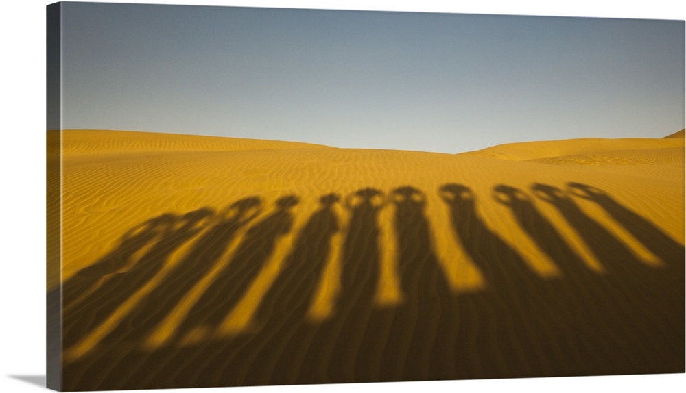Shadows of waterbearers,-Thar Desert, India