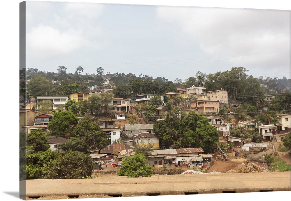 Africa, Sierra Leone, Freetown. Suburban development houses on a hillside.