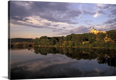 Slovakia, West Slovakia, Trencin Trencin Castle at sunset, reflected in Vah River