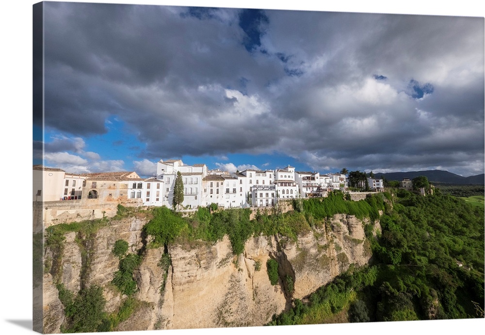 Spain, Andalusia. Ronda perches on the rugged defensible limestone cliffs.