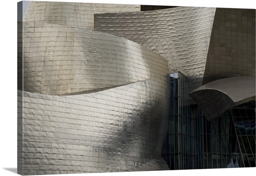 Spain, Bilbao. Guggenheim Museum designed by architect Frank Gehry, reflective titanium panels.