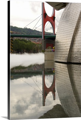 Spain, Bilbao. Guggenheim Museum With Mist and Bridge Reflections