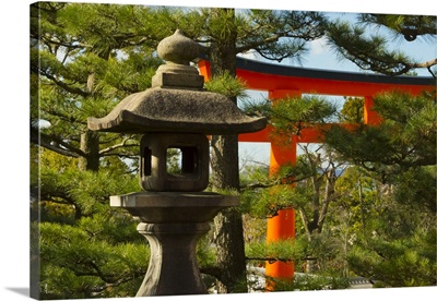 Stone Lantern And Torii Gate In Fushimi Inari Shrine, Kyoto, Japan