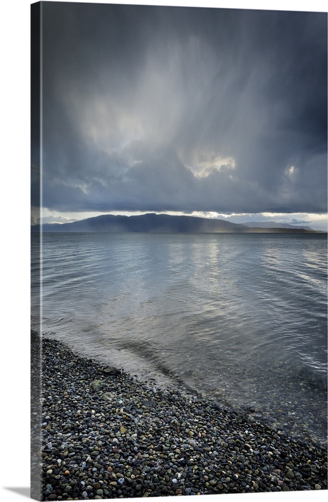 Stormy winter clouds over Bellingham Bay, Washington State. Lummi Island in the distance.
