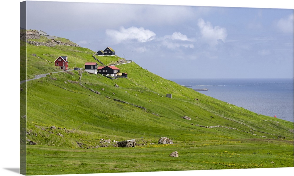 Village Velbastadur (Velbastathur). The island Streymoy, one of the two large islands of the Faroe Islands in the North At...
