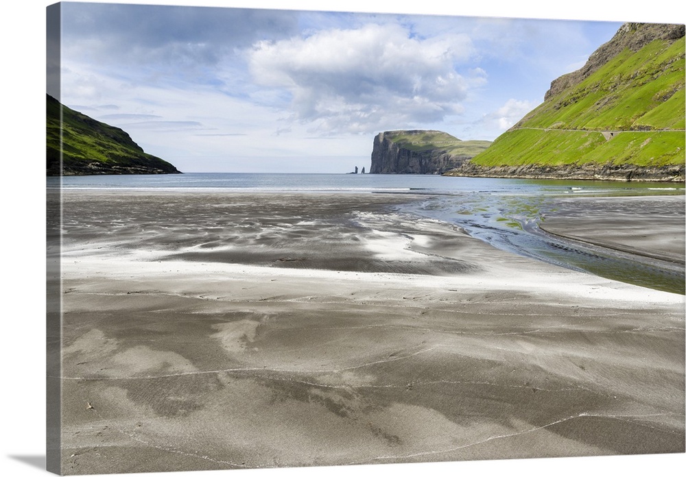 Beach at Tjornuvik. In the background the island Eysturoy with the iconic sea stacks Risin and Kellingin. The island Strey...