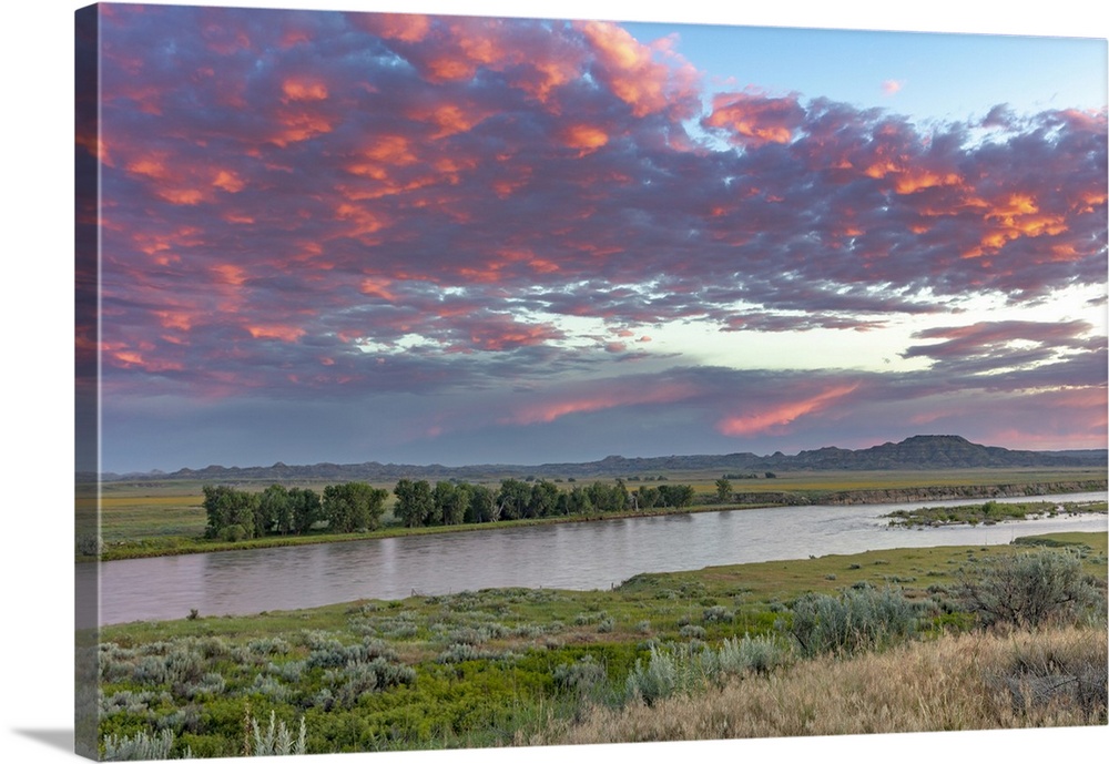 USA, North America, Montana. Sunrise And Clouds Over The Yellowstone River At The Confluence With The Powder River Near Te...