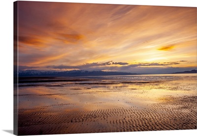 Sunset over Great Salt Lake looking west toward Lakeside Mountains and Stansbury Utah