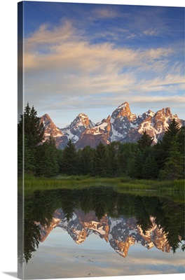 Teton Mountains reflected in backwater of Snake River at Scwabacher Landing