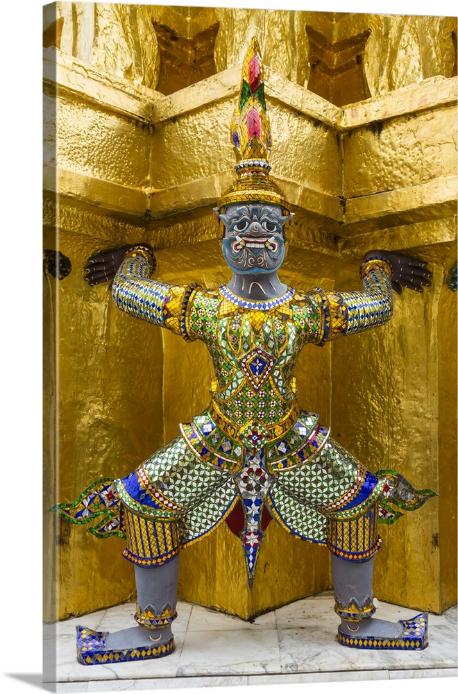 Thailand, Bangkok.Yaksha guard one of the golden chedi at Wat Phra Kaew.