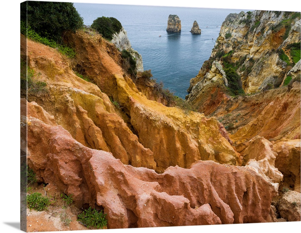 The cliffs and sea stacks of Ponta da Piedade at the rocky coast of the Algarve in Portugal. Europe, Southern Europe, Port...