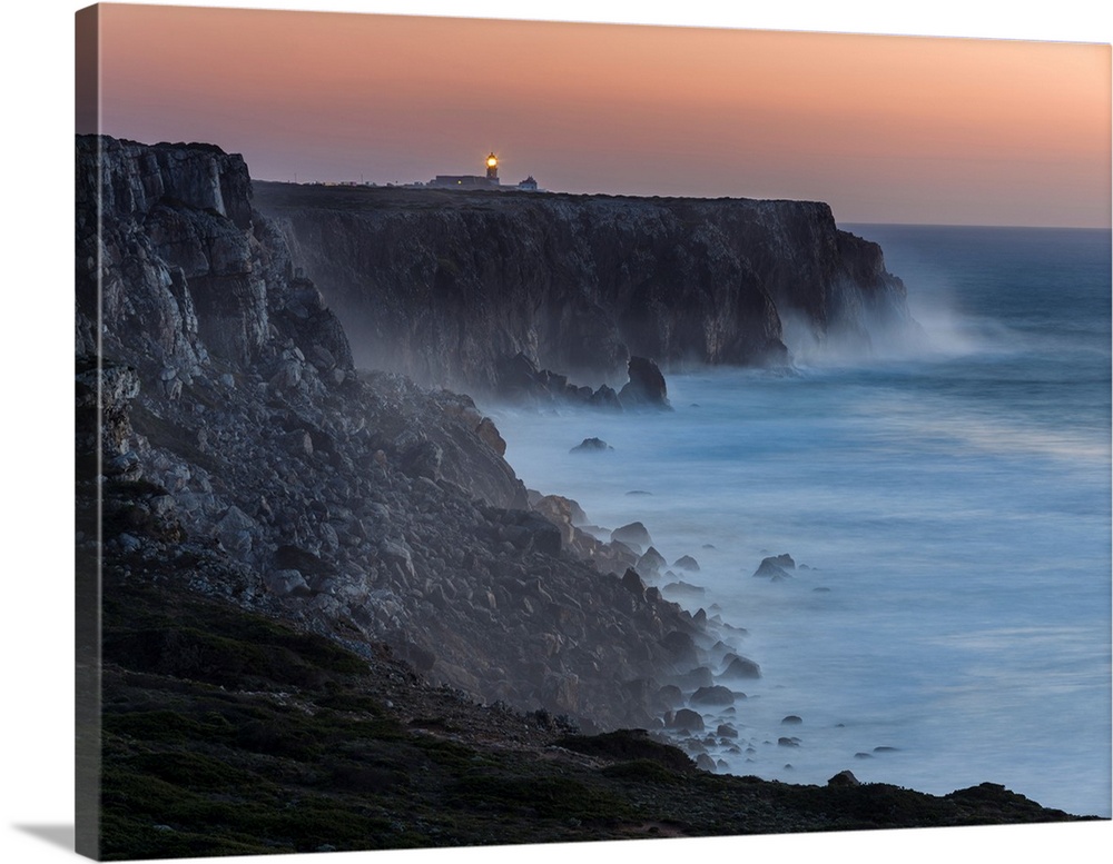 Cabo de Sao Vincente (Cape St. Vincent) with its lighthouse at the rocky coast of the Algarve in Portugal. Europe, Souther...