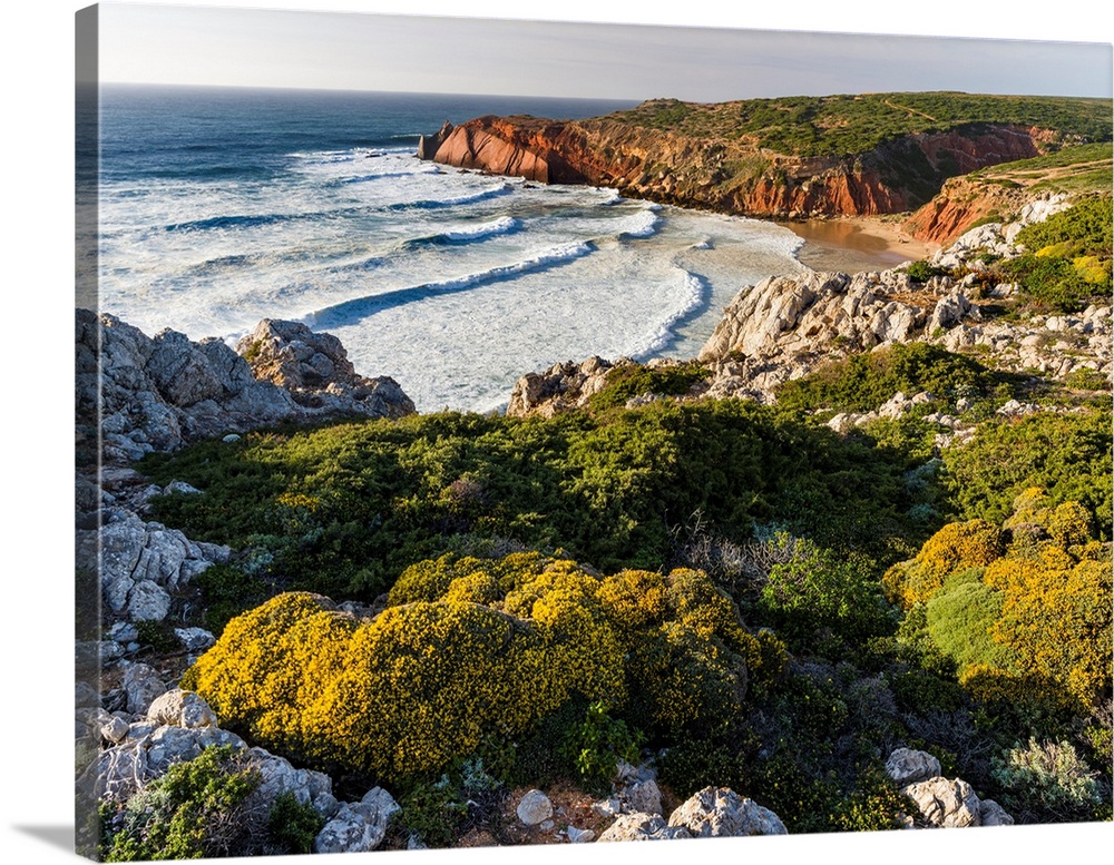 Beach and cliffs at Praia do Telheiro at the Costa Vicentina. The coast of the Algarve during spring. Europe, Southern Eur...
