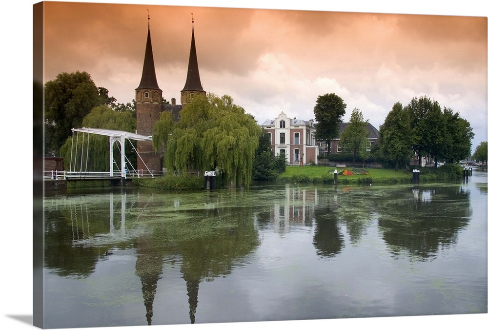 The Eastern Gate and center along a canal in the city of Delft, Netherlands.