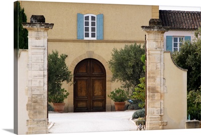 The main entrance and building with stone portico, Chateau de Beaucastel, France