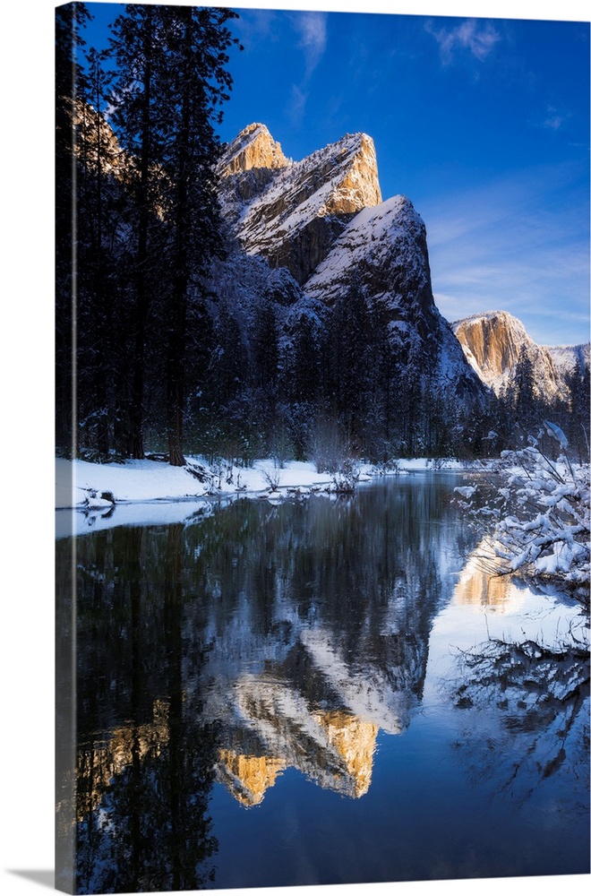 The Three Brothers above the Merced River in winter, Yosemite National Park, California USA.