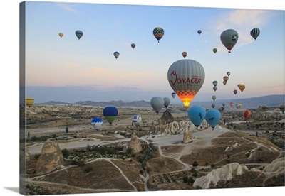 Turkey,Anatolia,Cappadocia, Goreme. Hot Air Balloons Flying Above