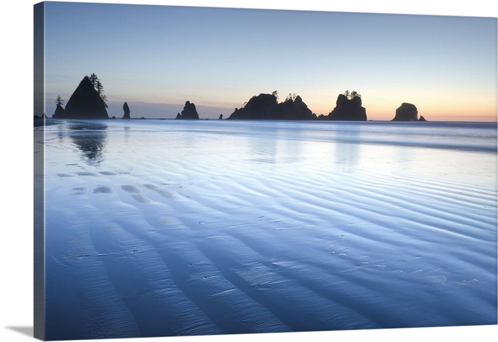 Twilight over Shi Shi Beach, sea stacks of Point of the Arches are in the distance. Olympic National Park, Washington State.