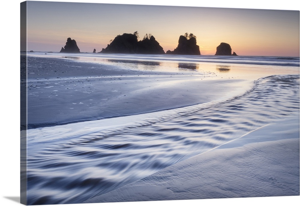 Twilight over Shi Shi Beach, sea stacks of Point of the Arches are in the distance. Olympic National Park, Washington State.