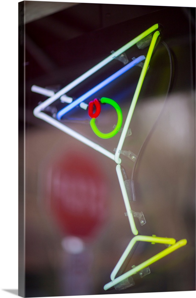 United States, Washington, Seattle. A neon sign at a bar in the shape of a martini.