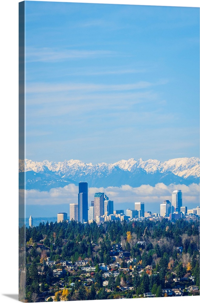 United States, Washington. Seattle skyline and Olympic mountains viewed from Bellevue.