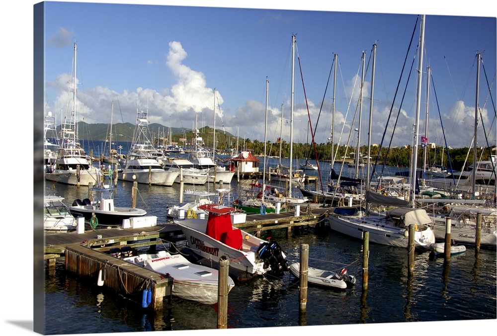Caribbean, U.S. Virgin Islands, St. Thomas, Red Hook. Popular pier area near the ferry dock. Island of St. John in the dis...