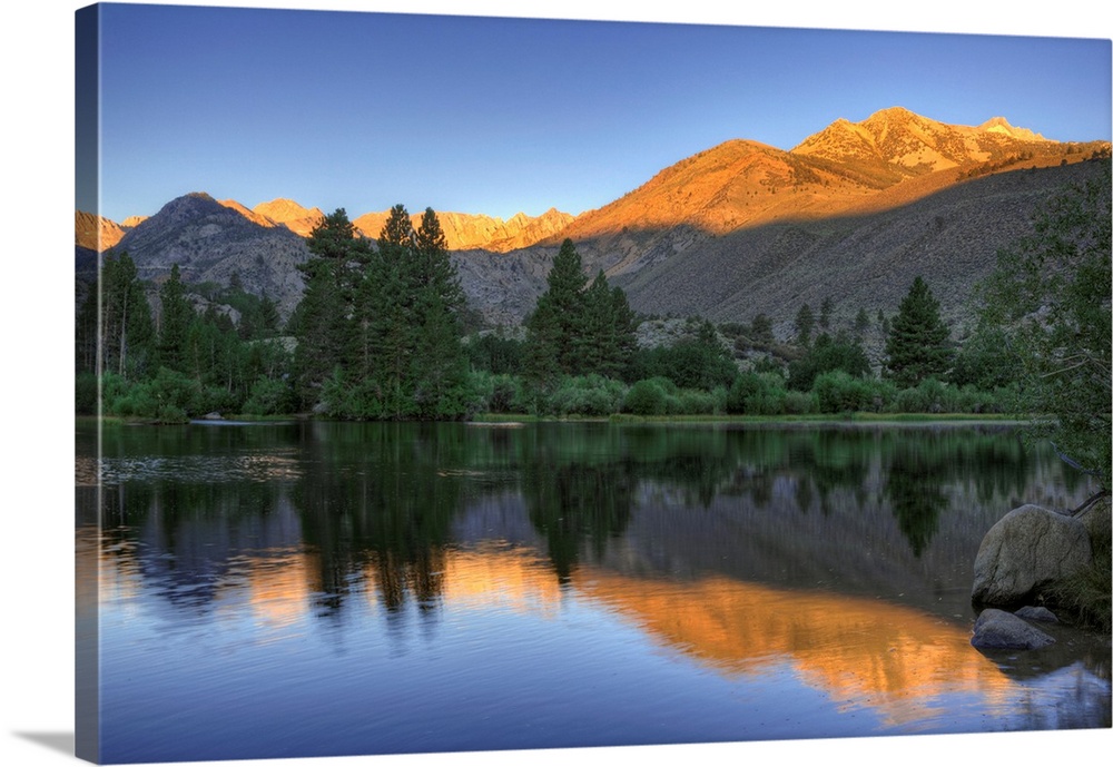 USA, California, Bishop. Sunrise on mountain lake.