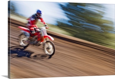 USA, California, Mammoth Lakes, Blur Of Motocross Racer