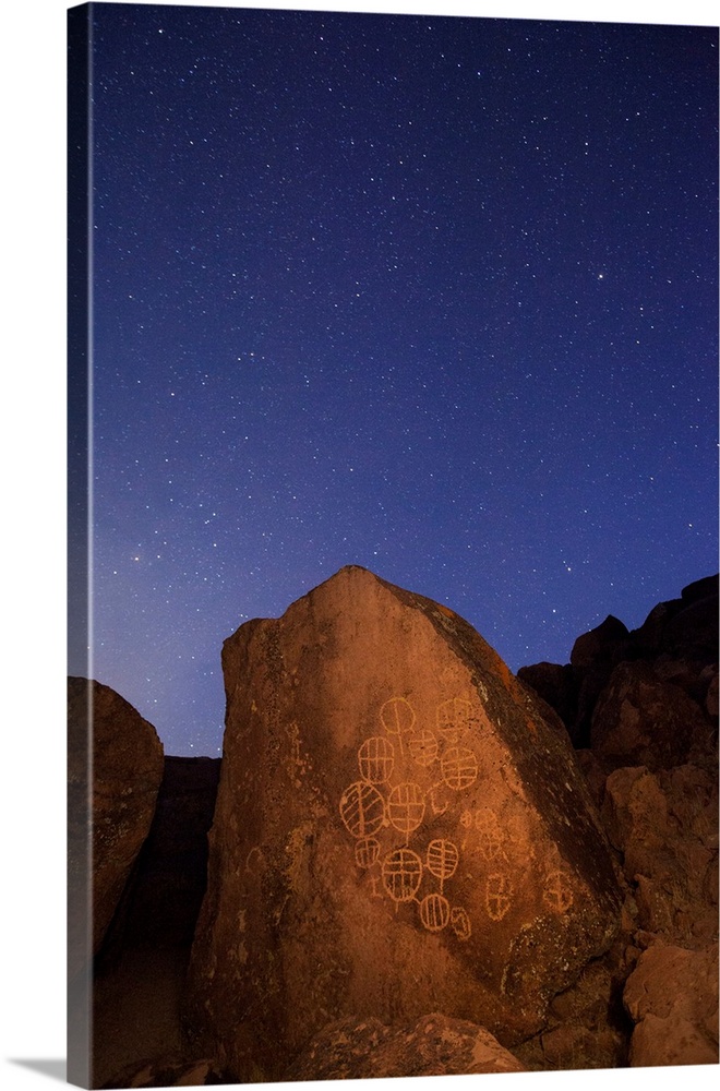 USA, California, Owens Valley. Native American petroglyphs at night.
