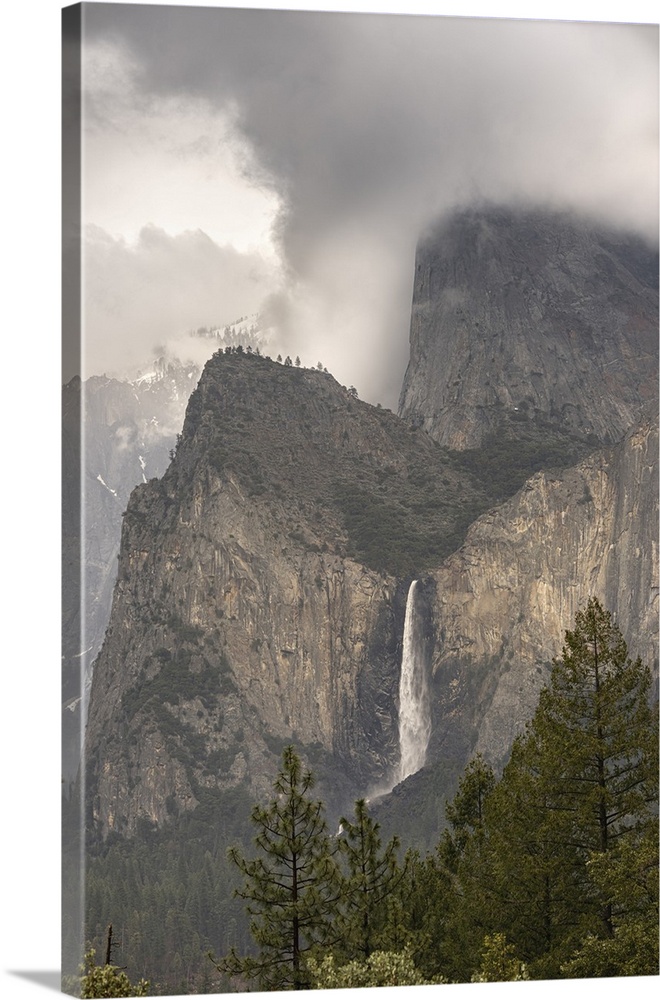 USA, California, Yosemite National Park. Clouds and mountain with Bridalveil Fall.
