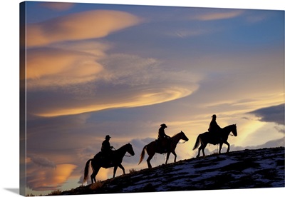 USA, Shell, Wyoming, Hideout Ranch, Cowboys And Cowgirls Silhouetted, Sunset