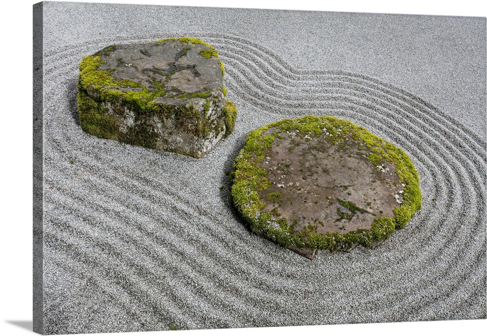 USA, Washington, Bainbridge Island. Raked sand around rock.