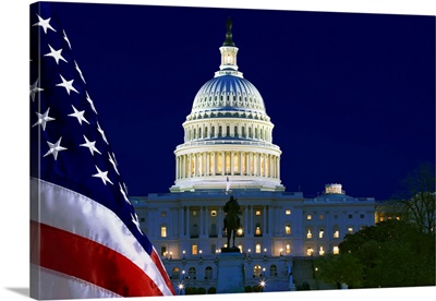 USA, Washington, DC, Capitol Building and US flag at night