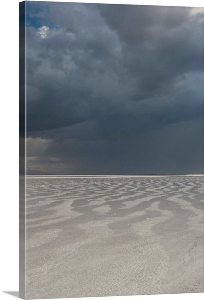 North America, USA, Utah, Bonneville Salt Flats.  Passing thunderstorm over Bonneville Salt Flats, leaving flooded desert ...