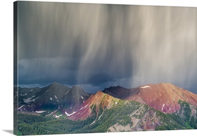 Virga and storm moving over mountains near Crested Butte, Colorado