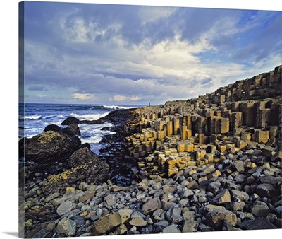 Visitors comb basalt blocks at Giant's Causeway on the Antrim Coast in Northern Ireland