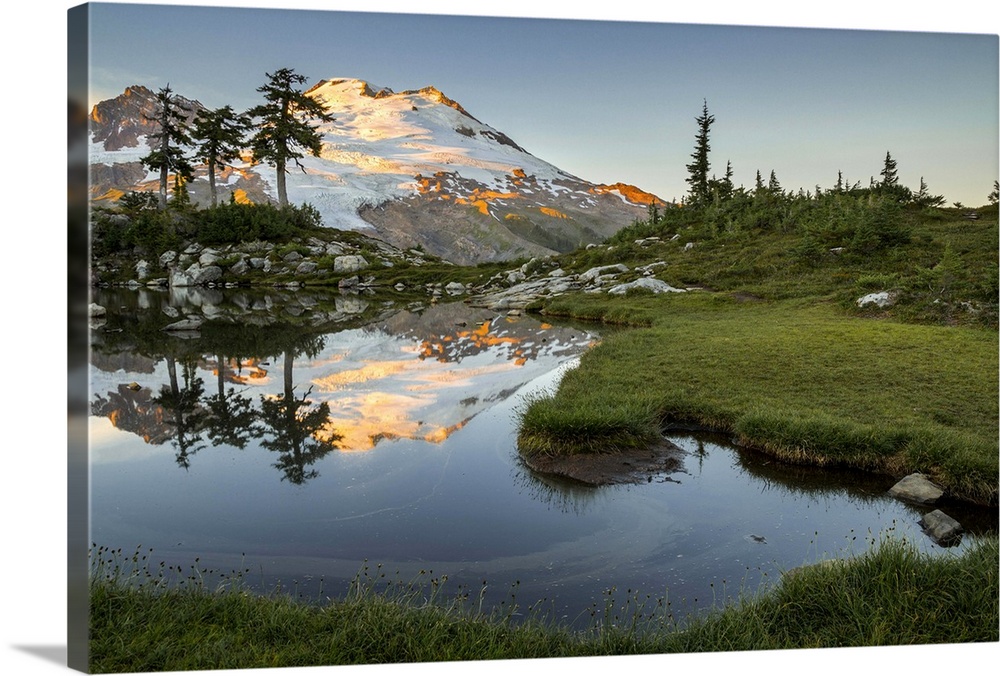 USA, Washington State. Mt. Baker reflecting in a tarn on Park Butte.