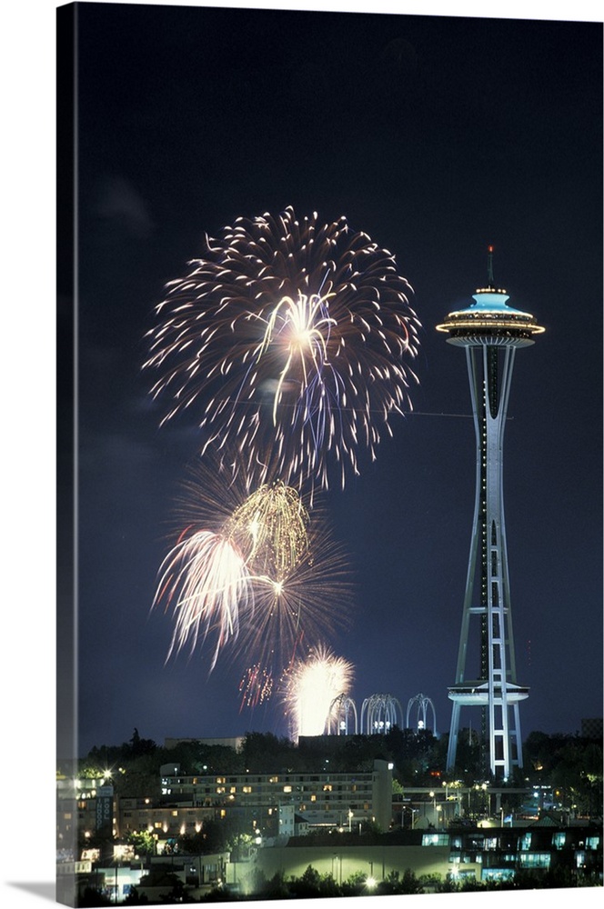 Washington, Seattle, Fireworks and Space Needle during July Fourth celebration.