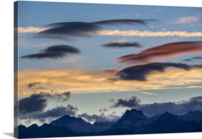 Washington State, Leavenworth, Colorful Clouds At Sunset Over Mountains
